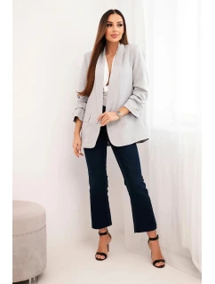 Šedé sako s elegantnými klopami