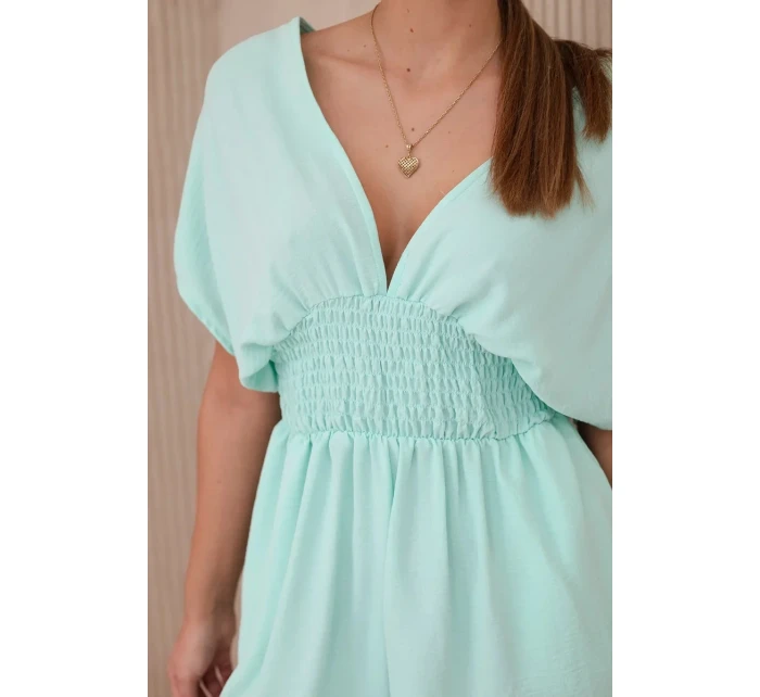 Kombinéza s volánikmi v páse mätová