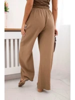 Mušelínové nohavice so širokou ťavou