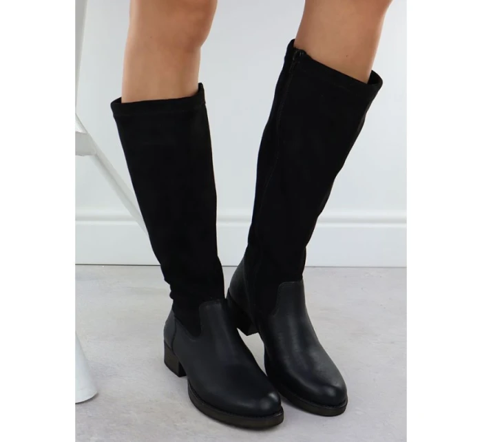 Dámske kožené topánky na klinoch zateplené čierne Rieker 9551