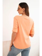 Dámska bavlnená blúzka s dlhými rukávmi a gombíkmi vo výstrihu marhuľová