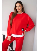 Dámska súprava maslovej farby s voľnou mikinou a teplákmi červená Dámska súprava maslovej farby s voľnou mikinou a teplákmi červená