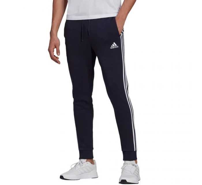Pánské kalhoty Essentials Fleece Tapered Cuff M  model 17536433 - ADIDAS