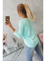 Pozoruhodná mätová blúzka s 3D grafikou