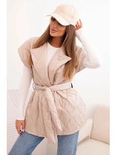 Dámska prešívaná vesta s opaskom a širokým golierom béžová