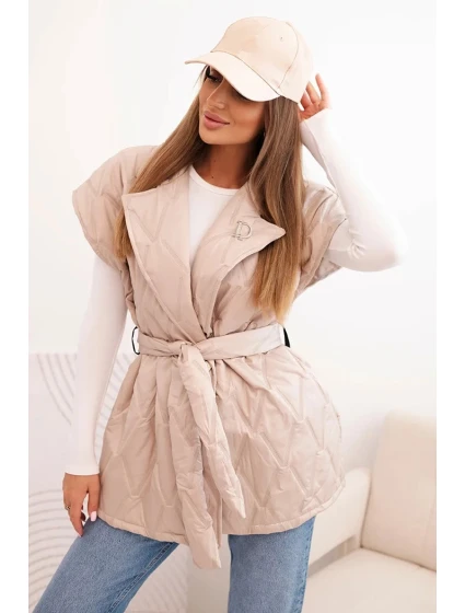 Dámska prešívaná vesta s opaskom a širokým golierom béžová