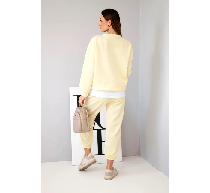 Dámská souprava s volná mikina a tepláky žlutý model 21808625 - K-Fashion Dámská souprava s volná mikina a tepláky žlutý model 21808625 - K-Fashion