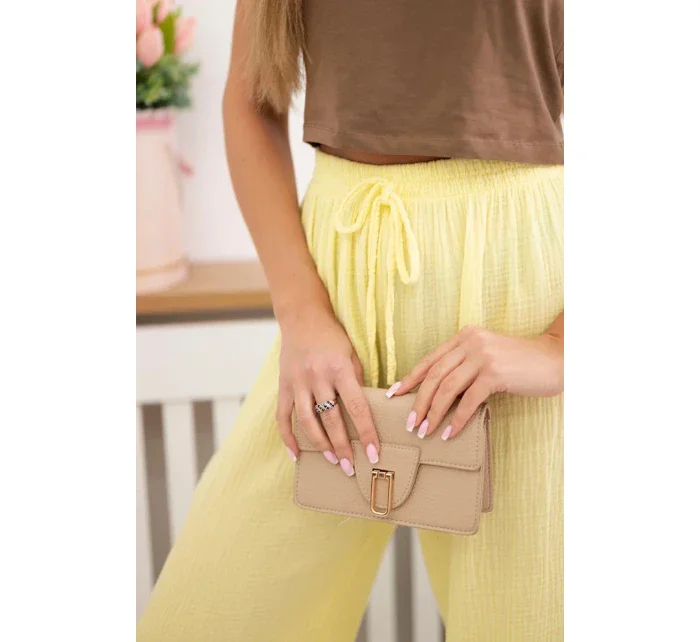 Mušelínové nohavice so širokými nohavicami žltej farby