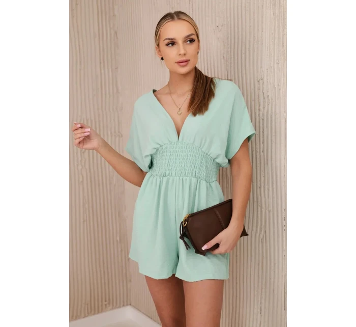 Kombinéza s volánikmi v páse tmavá mentolová