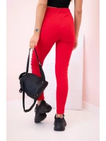 Dámske tepláky s opaskom a šnúrkou na stiahnutie červené