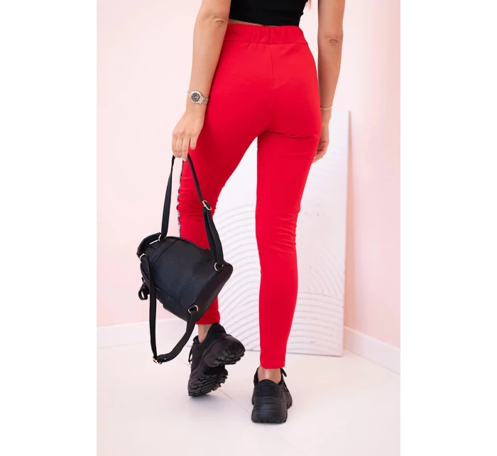 Dámske tepláky s opaskom a šnúrkou na stiahnutie červené