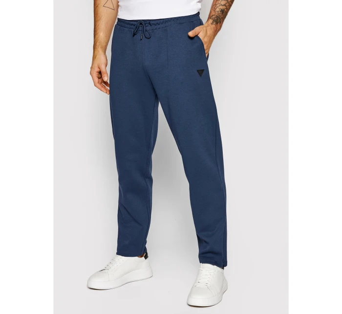 Pánské teplákové kalhoty Tmavě modrá model 21889931 - Guess Pánské teplákové kalhoty Tmavě modrá model 21889931 - Guess