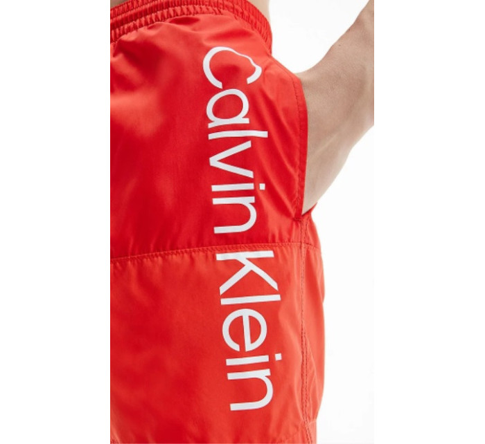 Pánske kúpacie kraťasy - KM00729 XNL - červená - Calvin Klein