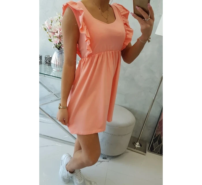 Šaty s volánikmi na bokoch marhuľová Šaty s volánikmi na bokoch marhuľová