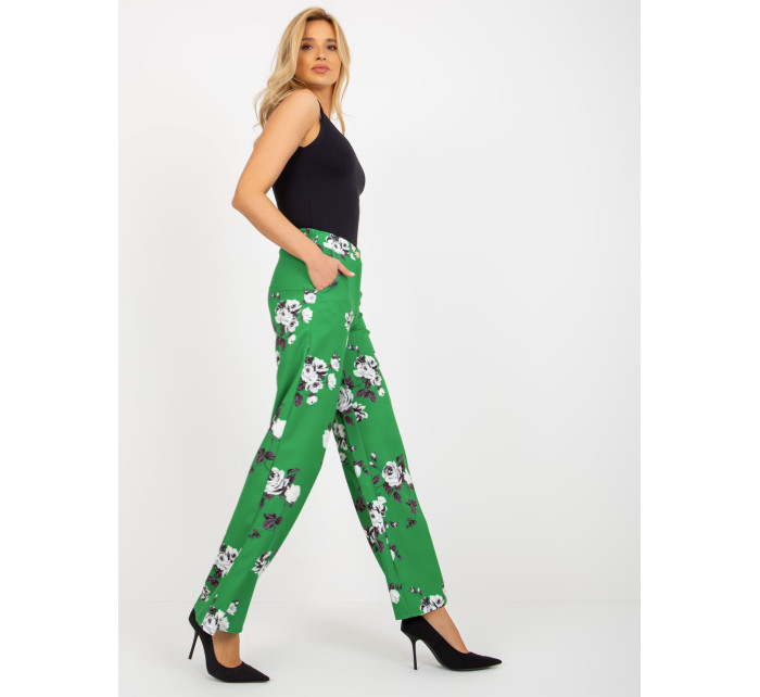 Zelené široké látkové nohavice s kvetmi z obleku