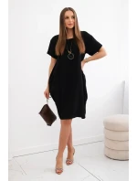 Šaty s vreckami a príveskom Čierne