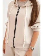 Dámska maslová súprava so širokými nohavicami a mikinou na zips béžová Dámska maslová súprava so širokými nohavicami a mikinou na zips béžová