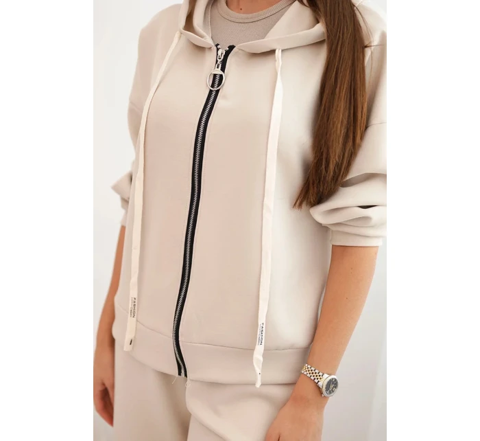 Dámska maslová súprava so širokými nohavicami a mikinou na zips béžová Dámska maslová súprava so širokými nohavicami a mikinou na zips béžová