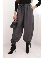 Dámske nohavice so širokými nohavicami a viazaním v spodnej časti graphite Dámske nohavice so širokými nohavicami a viazaním v spodnej časti graphite