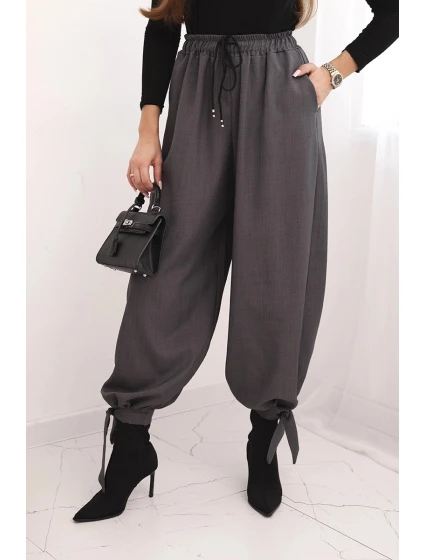 Dámske nohavice so širokými nohavicami a viazaním v spodnej časti graphite Dámske nohavice so širokými nohavicami a viazaním v spodnej časti graphite