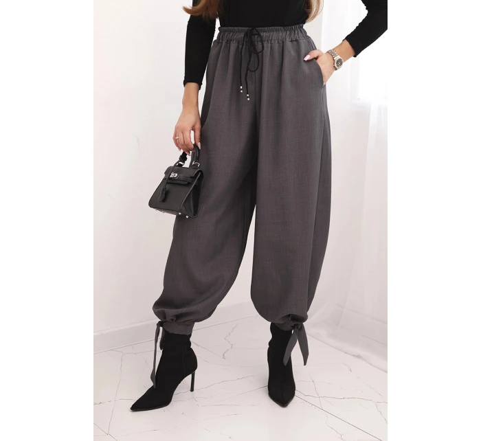 Dámske nohavice so širokými nohavicami a viazaním v spodnej časti graphite Dámske nohavice so širokými nohavicami a viazaním v spodnej časti graphite
