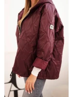 Dámska prešívaná bunda s kapucňou slivka Dámska prešívaná bunda s kapucňou slivka