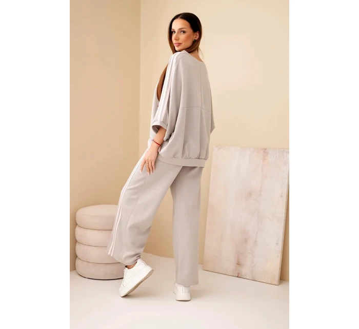 Dámsky viskózový maslový komplet so širokými nohavicami a voľnou blúzkou Fango