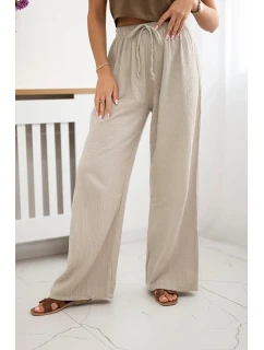 Široké mušelínové nohavice béžovej farby