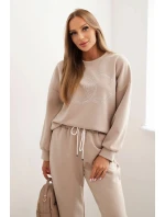 Dámska súprava z viskózy s ozdobným motívom a nohavicami béžová Dámska súprava z viskózy s ozdobným motívom a nohavicami béžová