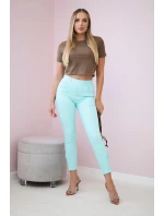 Farebné džínsové nohavice s mätovou mašľou