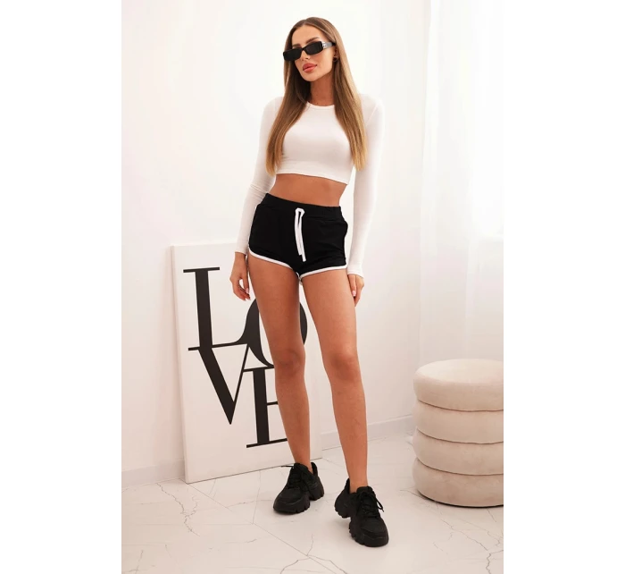 Dámské bavlněné šortky s elastickým pasem a model 21772746 lemem černé - K-Fashion Dámské bavlněné šortky s elastickým pasem a model 21772746 lemem černé - K-Fashion