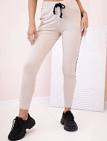 Dámske tepláky s opaskom a šnúrkou na stiahnutie béžové