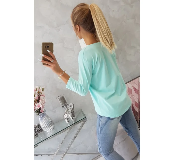 Halenka s 3D grafikou kočky v mátové barvě Halenka s 3D grafikou kočky v mátové barvě