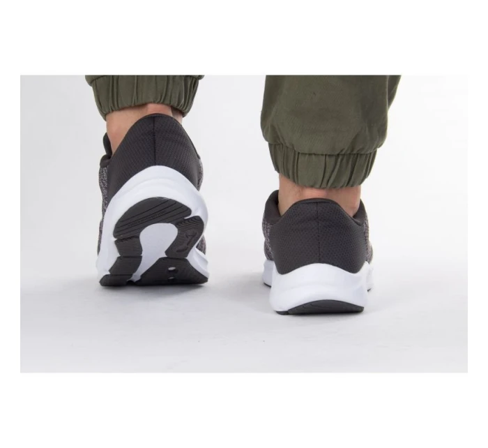 Pánske športové nohavice Charged Pursuit 3 Twist M 3025945-100 - Under Armour Pánske športové nohavice Charged Pursuit 3 Twist M 3025945-100 - Under Armour