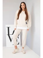 Dámska súprava s maslovou mikinou a voľnými teplákmi béžová Dámska súprava s maslovou mikinou a voľnými teplákmi béžová