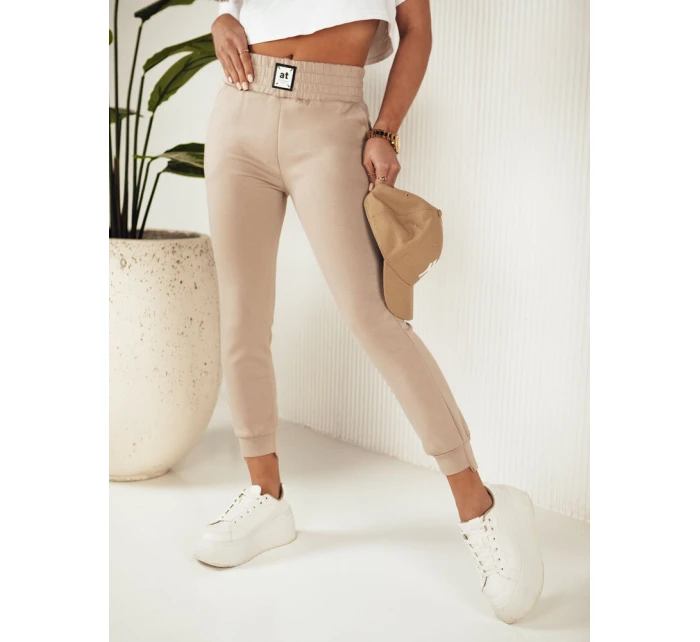 Dámské tepláky beige Dstreet model 21972397 - FashionStreet Dámské tepláky beige Dstreet model 21972397 - FashionStreet