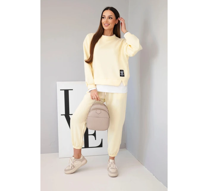 Dámská souprava s volná mikina a tepláky žlutý model 21808625 - K-Fashion Dámská souprava s volná mikina a tepláky žlutý model 21808625 - K-Fashion