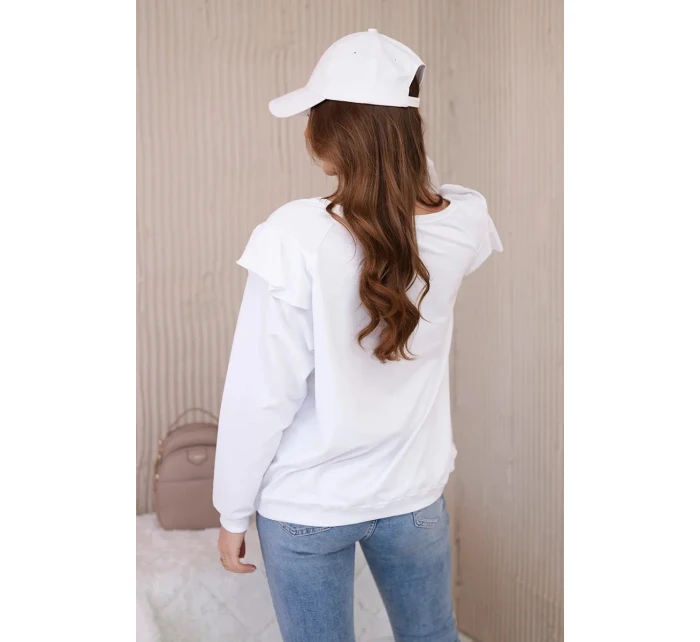 Bavlnená blúzka s volánikmi na ramenách biela Bavlnená blúzka s volánikmi na ramenách biela