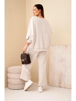 Dámsky maslový viskózový komplet so širokými nohavicami a voľnou blúzkou béžovej farby