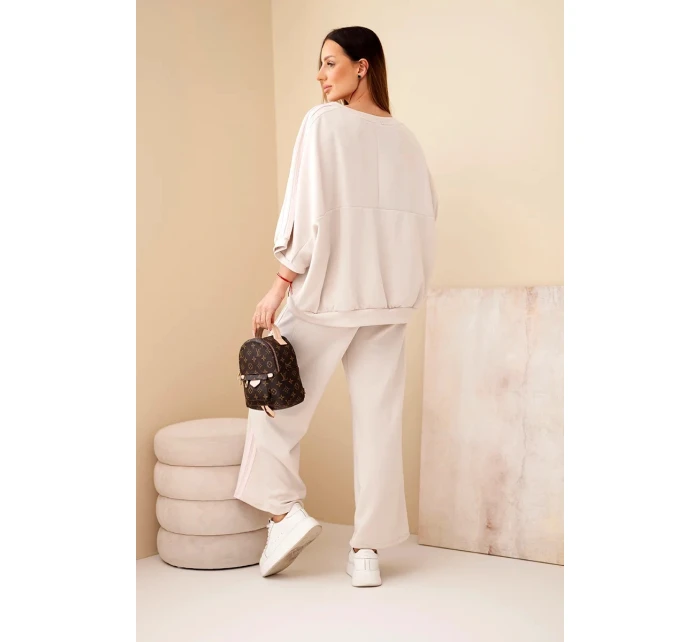 Dámsky maslový viskózový komplet so širokými nohavicami a voľnou blúzkou béžovej farby