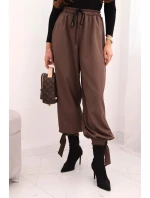 Dámske nohavice so širokými nohavicami a viazaním v spodnej časti mocca