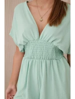 Kombinéza s volánikmi v páse tmavá mentolová