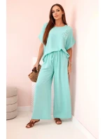 Dámský komplet z viskózy s ozdobným květem a širokými kalhotami - mátový