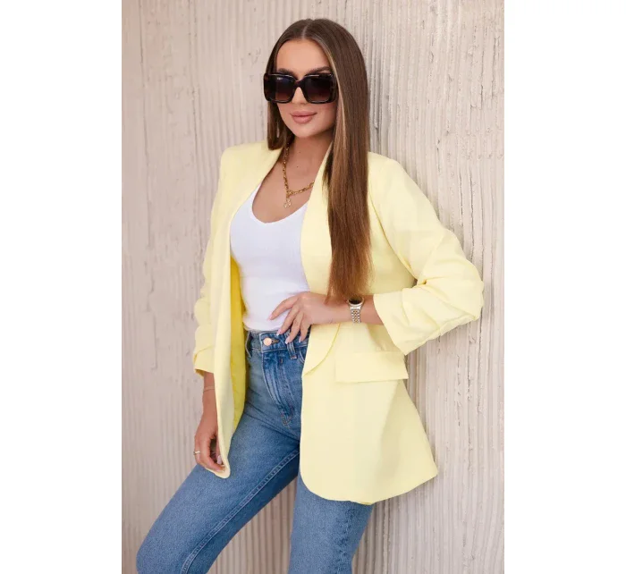 Bunda s klopami elegantná žltá Bunda s klopami elegantná žltá