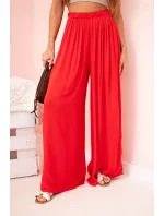 Dámske široké viskózové nohavice s elastickým pásom červené Dámske široké viskózové nohavice s elastickým pásom červené