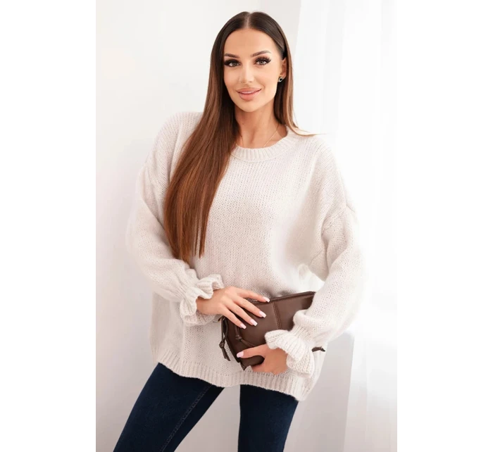 Dámsky sveter z mohéru a vlny voľného strihu béžovej farby Dámsky sveter z mohéru a vlny voľného strihu béžovej farby