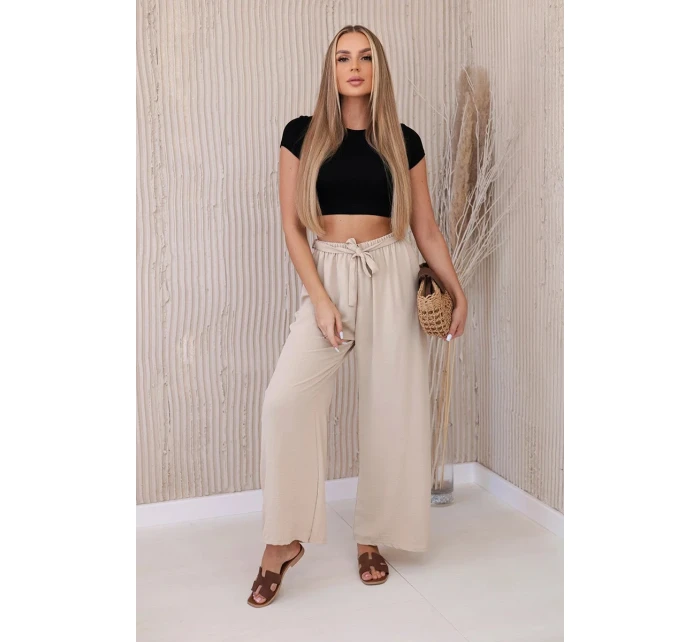 Kalhoty s širokým pasem beżowy Kalhoty s širokým pasem beżowy