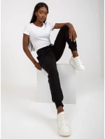 B 005 tepláky.11X čierna