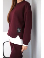 Dámska súprava s maslovou voľnou mikinou a teplákmi slivka Dámska súprava s maslovou voľnou mikinou a teplákmi slivka