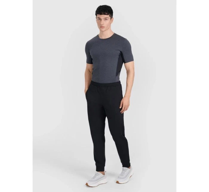 Pánské rychleschnoucí tréninkové kalhoty model 21437262 - 4F Pánské rychleschnoucí tréninkové kalhoty model 21437262 - 4F